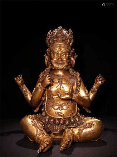 A QING DYNASTY BRONZE GILDED STATUE