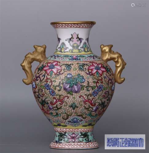 A QING YONGZHEN DYNASTY DOUBLE EARS BOTTLE WITH FRUIT AND MELON