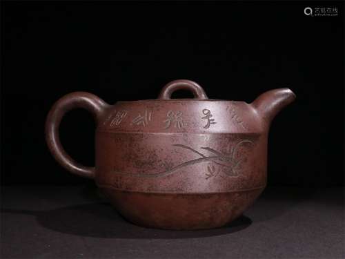 A QING DYNASTY PURPLE CLAY ORCHID POETRY TEAPOT