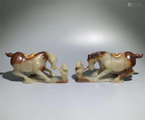 A PAIR OF LIAO DYNASTY WHITE JADE ORNAMENTS