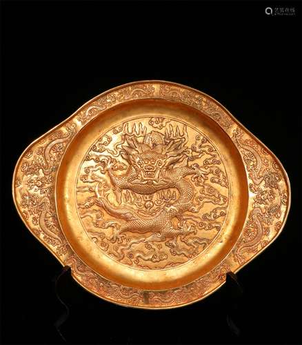 A QING DYNASTY BRONZE GILDED WITH GOLD DRAGON PLATE