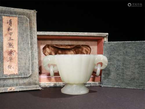 A QING DYNASTY HETIAN JADE SEED MATERIAL DOUBLE ELEPHANT EARS CUP