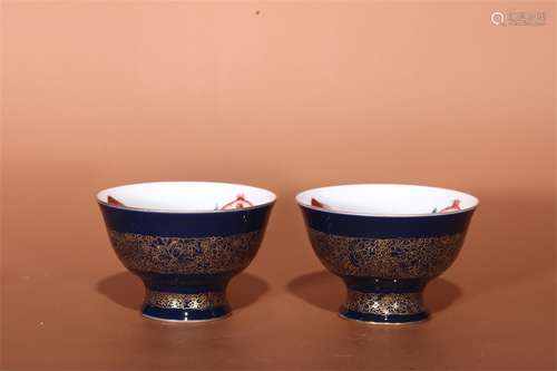 A PAIR OF YONGZHENG DYNASTY JI LAN DESCRIBES THE GOLDEN PONEGRANATE CUPS