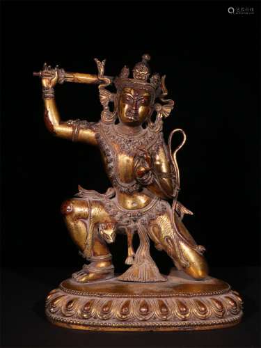 A MING DYNASTY BRONZE GILDED STATUE OF DHARMA PROTECTOR
