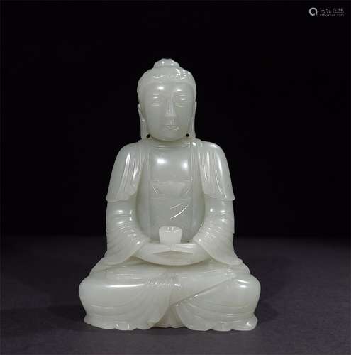 A QING DYNASTY WHITE BUDDHA JADE