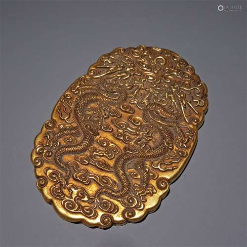 A QING DYNASTY BRONZE GILT IMPERIAL TOKEN