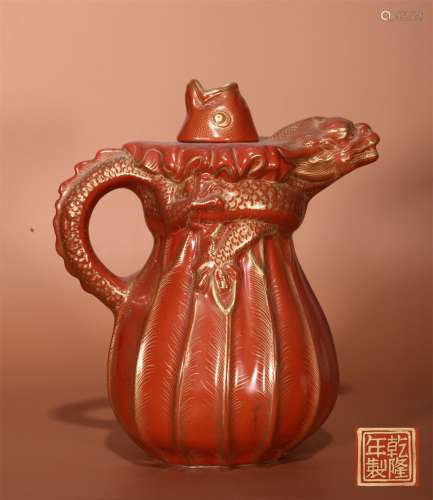 A QING QIANLONG DYNASTY AGATE RED PAINTED GOLD DRAGON HEAD POT
