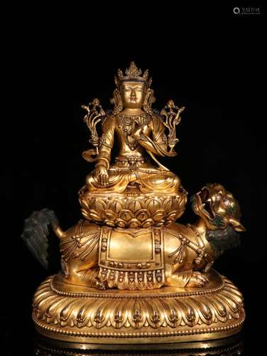 A MING DYNASTY BRONZE GILT MANJUSRI