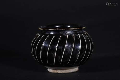 A SONG DYNASTY BLACK GLAZE GOURD JAR