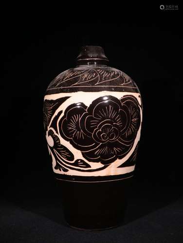 A SONG DYNASTY CIZHOU KILN BLACK GLAZE FLOWER CARVING JAR