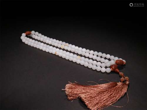 A STRING OF QING DYNASTY HETIAN JADE 108 ROSARY