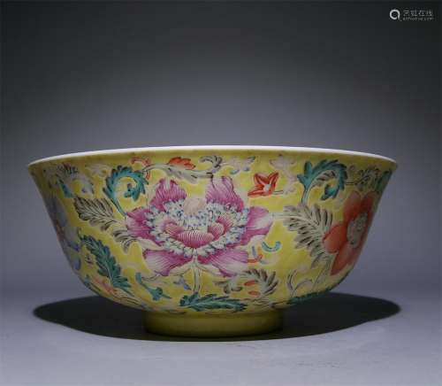 A QING DYNASTY YELLOW GROUND FAMILLE ROSE FLOWER BOWL