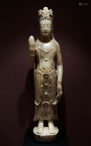 A NORTHERN QI DYNASTY STONE STATUE OF BODHISATTVA