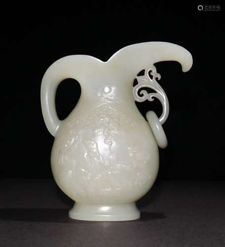 A QING DYNASTY HETIAN JADE WINE VESSEL