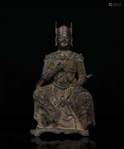 A MING DYNASTY BRONZE FIGURE