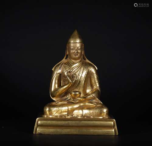 A QING DYNASTY BRONZE GILDED BUDDHA STATUE