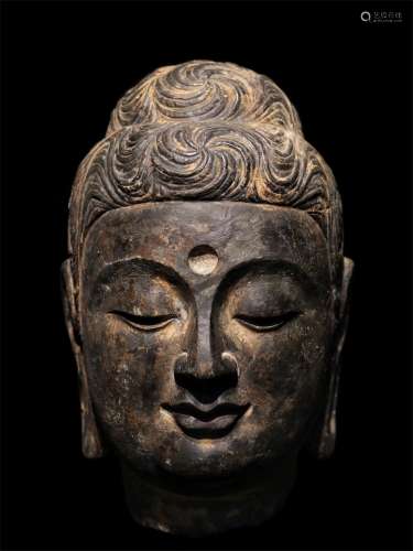 A NORTHERN QI DYNASTY CLIFF BUDDHA'S HEAD