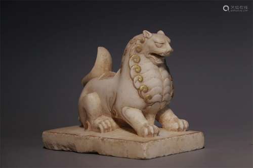 A NORTHERN WEI DYNASTY OF WHITE JADE STONE DHARMAPALA LION