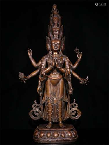 A MING DYNASTY RED COPPER THOUSAND HANDS GUANYIN