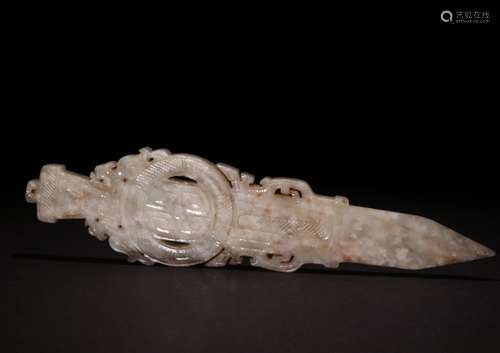 A MING DYNASTY WHITE JADE AXE SHAPED PENDANT