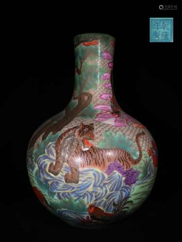 A QING DYNASTY FAMILLE ROSE CARVED PORCELAIN VASE WITH COLORED ZODIAC