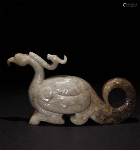 A MING DYNASTY BIRD ORNAMENT