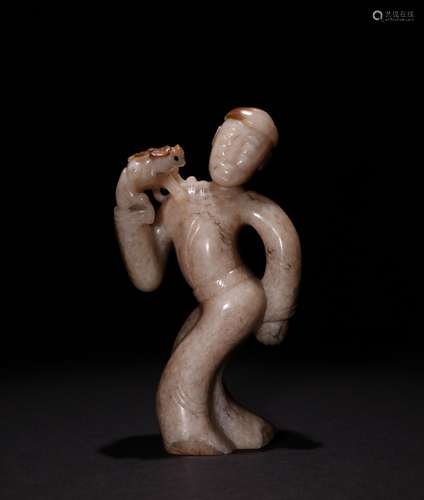 A MING DYNASTY WHITE JADE DANCER