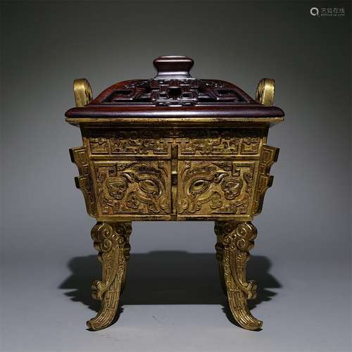 A QING DYNASTY BRONZE GILDED DING SHAPED INCENSE BURNER