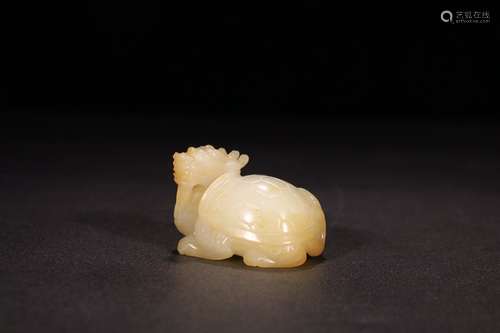 A Chinese Hetian Jade Paperweight With Beast Shape