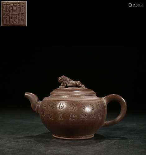 A Chinese Zisha Teapot With Potery Pattern