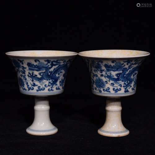 A Chinese Blue And White Cup With Dragon And Phoenix Pattern