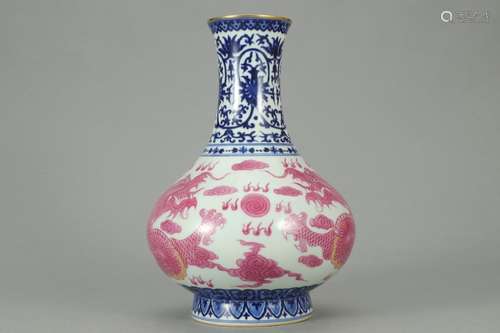 A Chinese Blue And White Glaze Vase With Dragon Carving