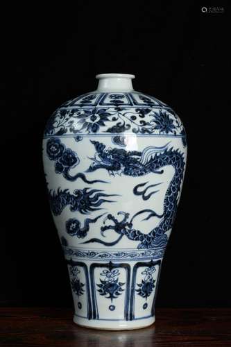 A Chinese Blue And White Meiping Vase With Dragon Carving