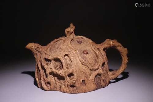 A Chinese Zisha Teapot Of Burl Pattern