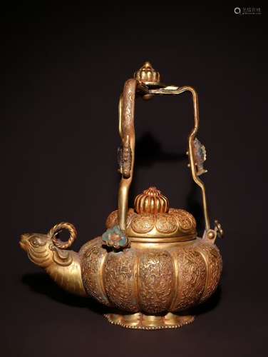 A Chinese Gilt Bronze Goat-Head Mouth Pot With Handle