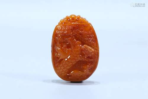 A Chinese Amber Pendant