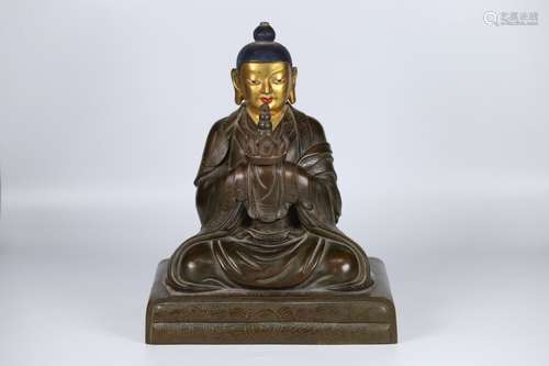 A Chinese Bronze Buddha With Facial Gold Painting