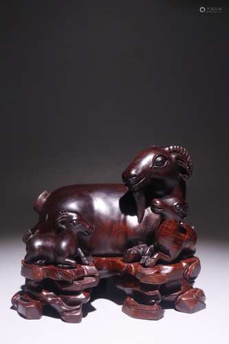 A Chinese Yellow Pear Wood Goat Shaped Ornament