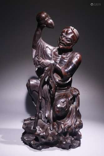 A Chinese Rosewood Arhat Statue