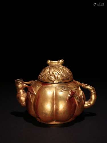 A Chinese Boxwood Teapot With Golden Painting