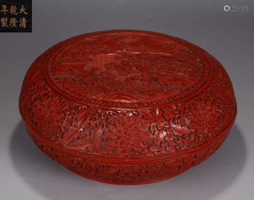 A RED LACQUER BOX WITH FIGURE PATTERN
