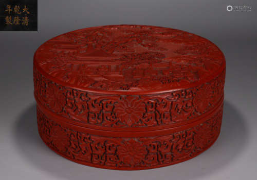 A RED LACQUER BOX WITH LANDSCAPE PATTERN