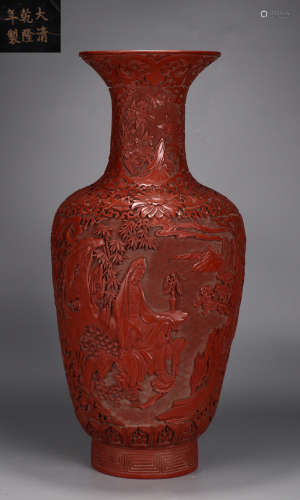 A RED GLAZE VASE WITH GUANYIN STATUE