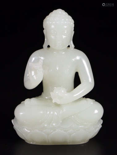 A HETIAN JADE CARVED BUDDHA STATUE