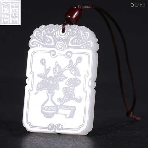 A HETIAN JADE CARVED FLOWER PATTERN TABLET