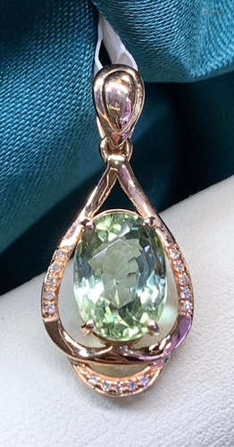 A 18K GOLD TOURMALINE DIAMOND PENDANT