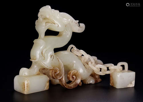 AN OLD HETIAN JADE SEAL WITH DRAGON SHAPE