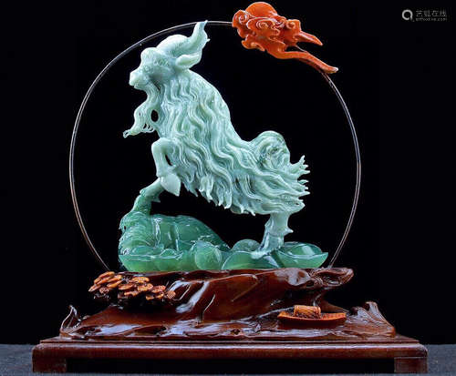 A JADE CARVED GOAT SHAPE ORNAMENT