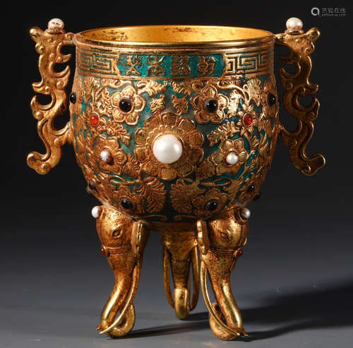 A GILT BRONZE WITH PEARL DOUBLE EAR CUP