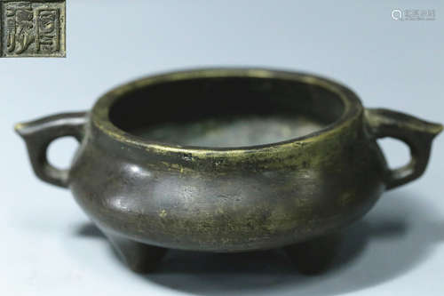 A COPPER CASTED TRIPOD CENSER